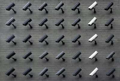 Wall of security surveillance cameras